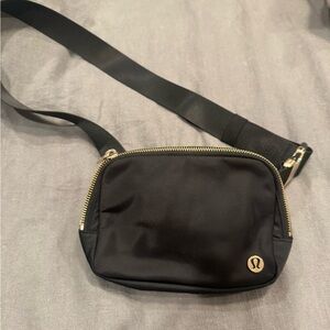 Lululemon Athletica Black Belt Bag with Gold Accents
